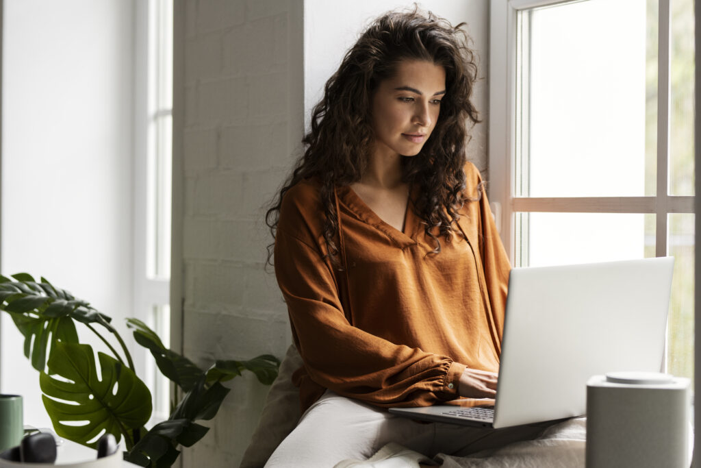 medium-shot-woman-working-laptop