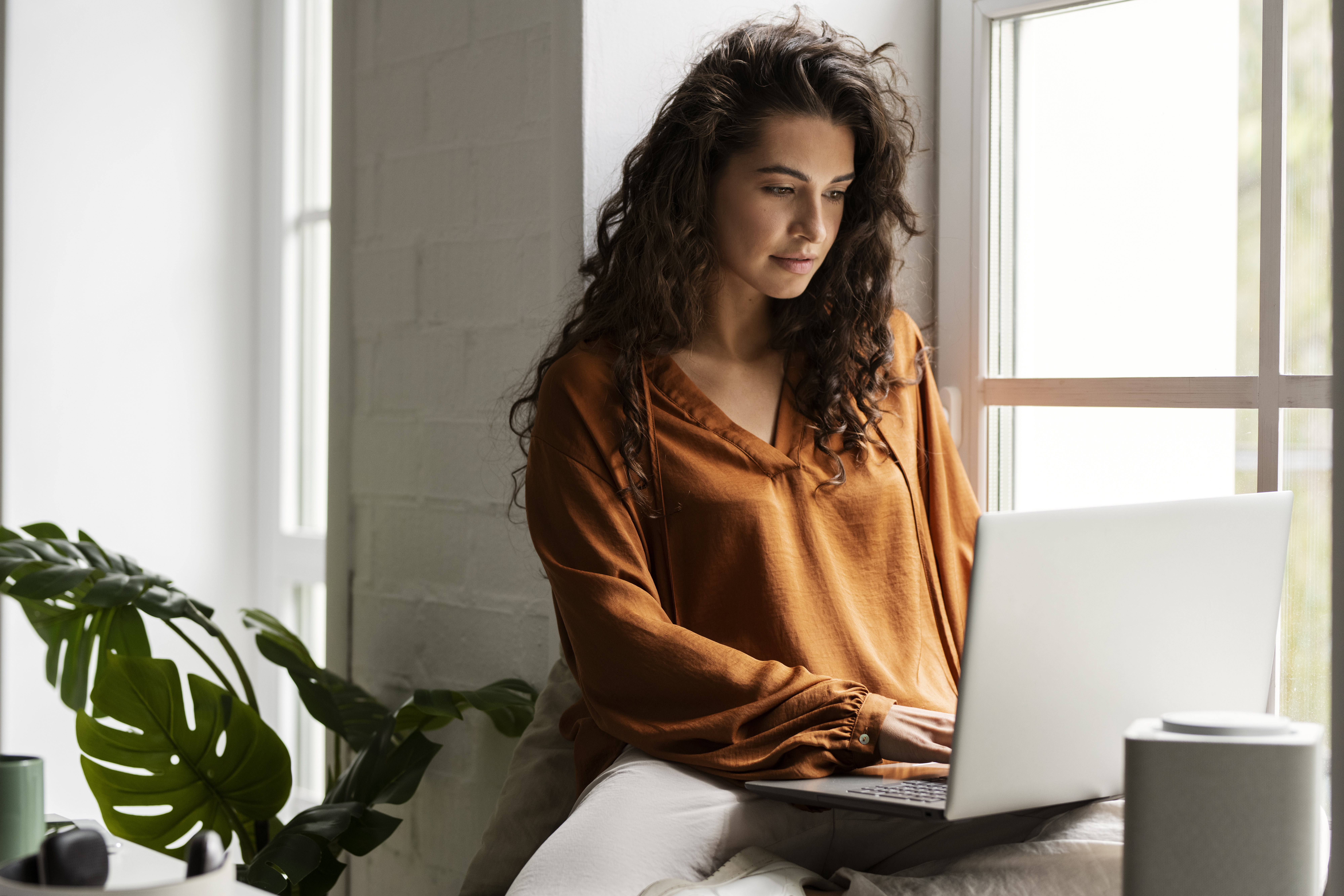 medium-shot-woman-working-laptop
